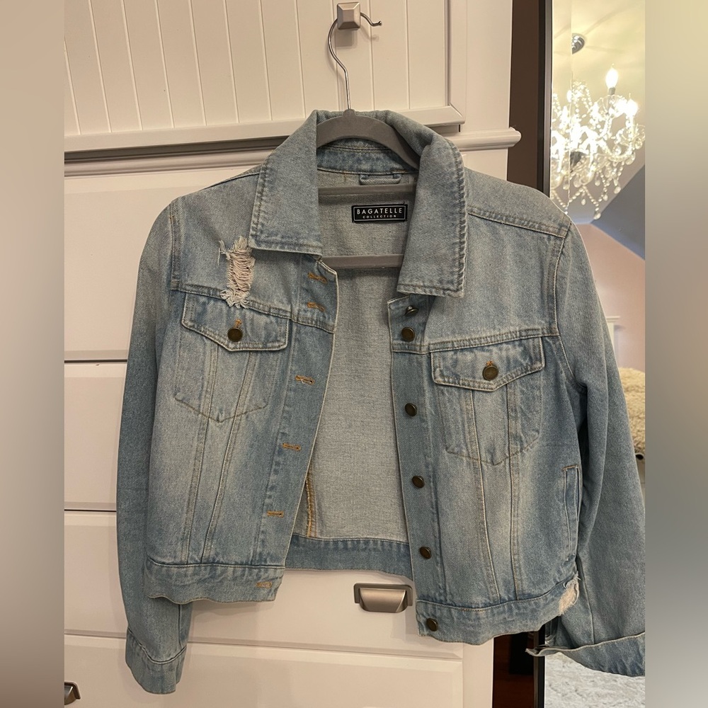 Distressed denim jacket